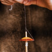 women spinning on a spindle